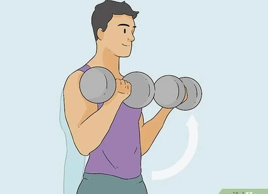 addım 1 bicepsinizi birbaşa hədəfləmək üçün dumbbell qıvrımlarını yerinə yetirin.