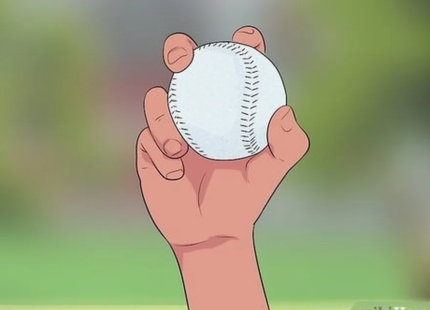 addım 2 küpə baxın's wrist to determine how the ball is thrown.