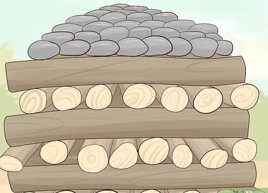 addım 5 yanğın yığını etmək üçün odun və vulkanik daşları yerə yığın.